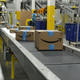 amazon boxes on a conveyor belt